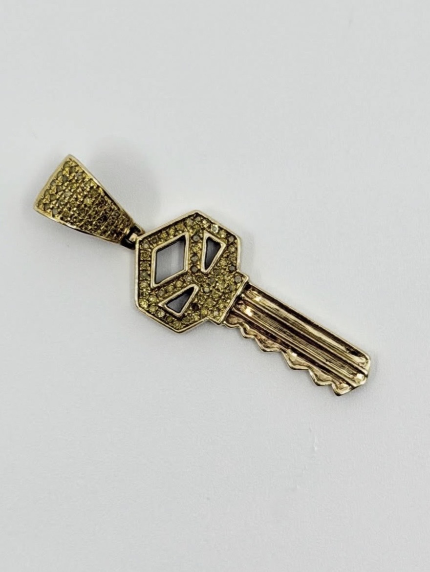Bespoke gold pavé diamond key pendant